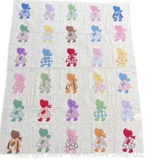 Hand Stitched Flour Sack Quilt in Sunbonnet Sue Pattern. 73" x 87"