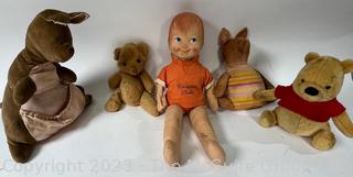 Set of Vintage Gund Winnie The Pooh Stuffed Animals Including Christopher Robin.  Some damage to his hand. 