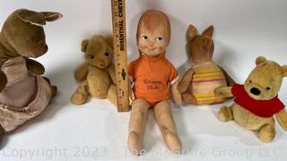 Set of Vintage Gund Winnie The Pooh Stuffed Animals Including Christopher Robin.  Some damage to his hand. 