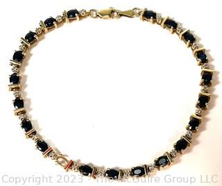 14kt Yellow Gold Sapphire and Diamond Tennis Bracelet with Safety Clasp.  Stone missing.  