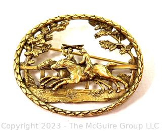 Openwork Brooch Featuring Horses Racing Marked CWF. 