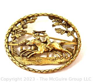 Openwork Brooch Featuring Horses Racing Marked CWF. 