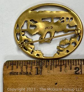 Openwork Brooch Featuring Horses Racing Marked CWF. 