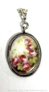 Hand Painted Glazed Porcelain Pendant in Sterling Silver Surround.