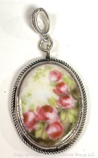 Hand Painted Glazed Porcelain Pendant in Sterling Silver Surround.