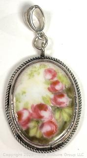 Hand Painted Glazed Porcelain Pendant in Sterling Silver Surround.