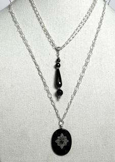 Two (2) Black Onyx Pendants on Sterling Silver Chain Necklaces.