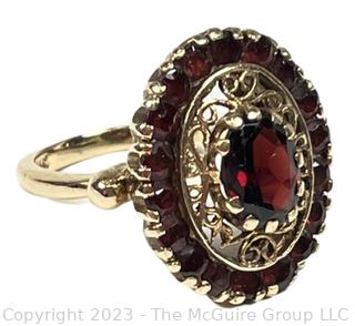 14Kt Yellow Gold and Garnet Cocktail Ring.  Weighs 7 grams 