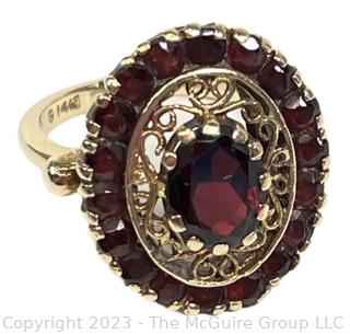 14Kt Yellow Gold and Garnet Cocktail Ring.  Weighs 7 grams 