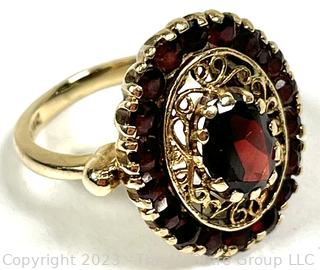 14Kt Yellow Gold and Garnet Cocktail Ring.  Weighs 7 grams 