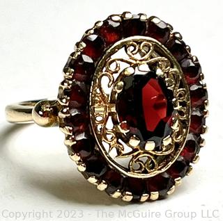 14Kt Yellow Gold and Garnet Cocktail Ring.  Weighs 7 grams 