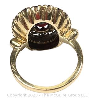 14Kt Yellow Gold and Garnet Cocktail Ring.  Weighs 7 grams 