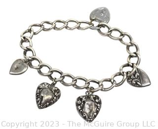 Sterling Silver Heart Charm Bracelet. 22 grams
