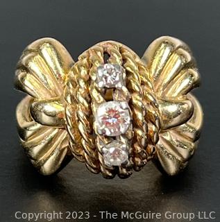 14KT Yellow Gold with Three (3) Diamonds Ribbon & Bow Shaped Ring. Weighs 9 grams