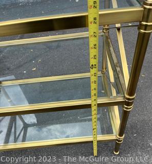 Three (3) Tier Brass with Glass Shelves Occasional Side Table. 27" x 18" x 29".  Second of two being offered in this auction.