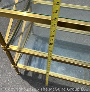 Three (3) Tier Brass with Glass Shelves Occasional Side Table. 27" x 18" x 29".  First of two being offered in this auction.