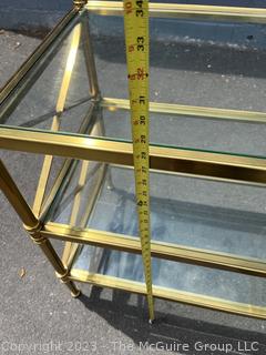 Three (3) Tier Brass with Glass Shelves Occasional Side Table. 27" x 18" x 29".  First of two being offered in this auction.