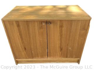 Heavy Mid Century Pine Two Door Cabinet.  Second of three offered in this auction.  20" x 28" x 35"