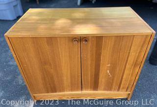 Heavy Mid Century Pine Two Door Cabinet.  Third of three offered in this auction.  20" x 28" x 35"