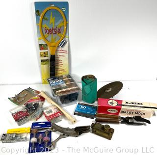 Group of Household Items Including Racquet Game and Bullet Mold