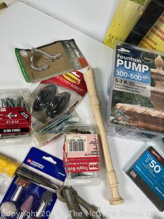 Group of Household Items Including Racquet Game and Bullet Mold