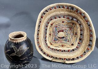 Woven Tribal Basket with Carved Vase.