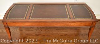 Brass & Cherry Leather Top Campaign Style Coffee Table. 49" wide, 15.5" Tall