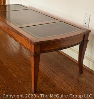 Brass & Cherry Leather Top Campaign Style Coffee Table. 49" wide, 15.5" Tall