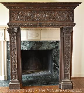 Antique French Renaissance Fireplace Mantel Surround or Chimneypiece in Carved Wood.  Separates into three (3) pieces