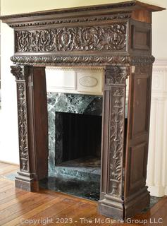 Antique French Renaissance Fireplace Mantel Surround or Chimneypiece in Carved Wood.  Separates into three (3) pieces