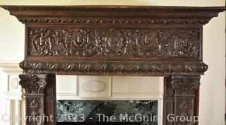 Antique French Renaissance Fireplace Mantel Surround or Chimneypiece in Carved Wood.  Separates into three (3) pieces