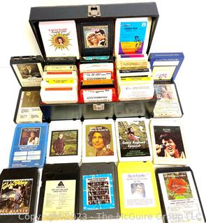 Group of Eight Track Tapes in Carrying Case.  Includes Elvis, Loretta Lynn, Grease Soundtrack, Johnny Cash & Grand Funk Railroad