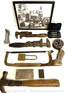 Group of Tools Including Photo of Man on Tractor