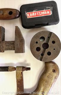 Group of Tools Including Photo of Man on Tractor