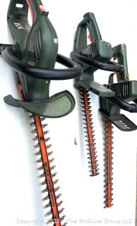 Three (3) Electric Hedge Trimmers. Working