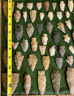 Collection of Flint Arrowheads Mounted on Felt Back Frame.  20" x 14".