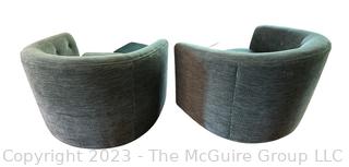 Pair of Mid-Century Barrel Back Swivel Lounge Chairs by Selig of Monroe.