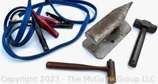 Group of Tools including Jumper Cables, Hammers and I Beam Anvil