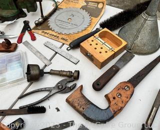 Group of Tools including Tap and Die Set, Galvanized Funnel, Bench Vise, NIB Circular Saw Blade, Knife with Leather Sheath and Keyhole Saw