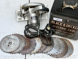 Black & Decker 7" Circular Saw AC-DC Cat No 260. Includes blades as shown