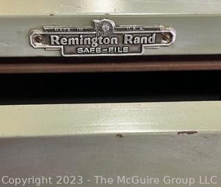 4 Drawer Cement Lined Safe-File Cabinet made by Remington Rand. Sargent and Greeenleaf Inc. Rochester NY. No combination, but open. Heavy. No steps to remove.