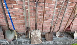 Large Grouping of Lawn and Garden Tools including Post Hole Digger, Hoes, Rakes, Shovels, Etc. 