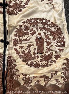 Antique Chinese Hand Embroidered Robe in Oyster Silk with Metallic Thread.  Some discoloration. 