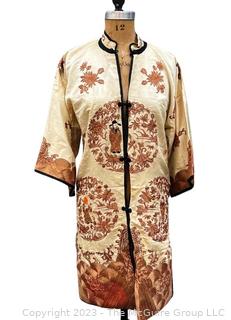 Antique Chinese Hand Embroidered Robe in Oyster Silk with Metallic Thread.  Some discoloration. 