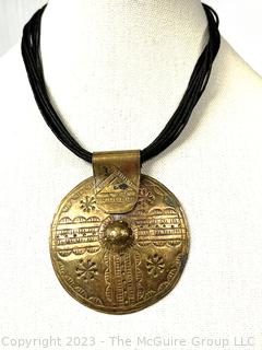 Large Brass Tribal Embossed Pendant Necklace on Leather Cord