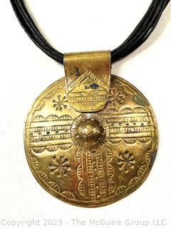 Large Brass Tribal Embossed Pendant Necklace on Leather Cord