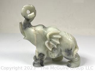 Carved Green Stone Elephant.  Small chip.  7" x 8".