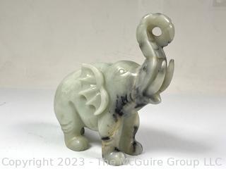 Carved Green Stone Elephant.  Small chip.  7" x 8".