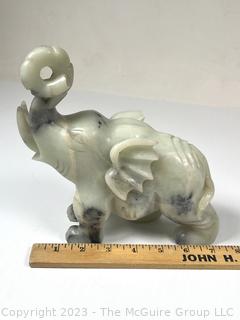 Carved Green Stone Elephant.  Small chip.  7" x 8".