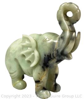 Carved Green Stone Elephant.  Small chip.  7" x 8".